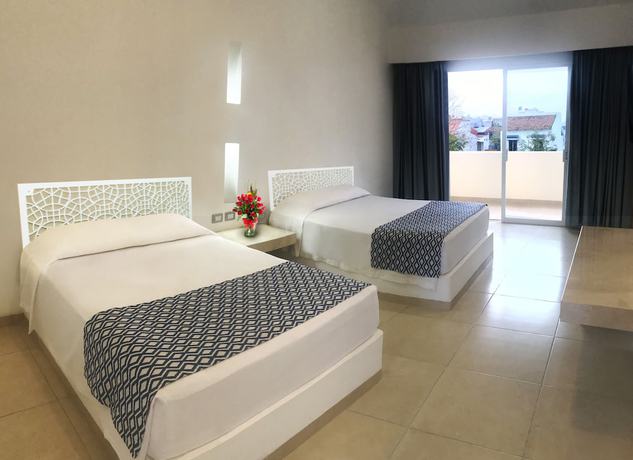 Imagen de la habitación del Hotel Huatulco Maxico. Foto 14