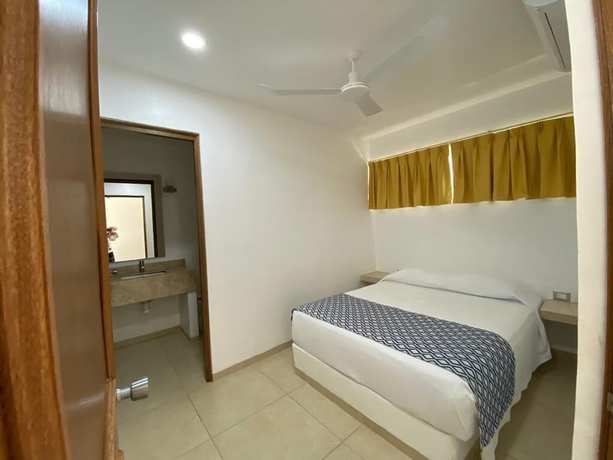 Imagen de la habitación del Hotel Huatulco Maxico. Foto 17