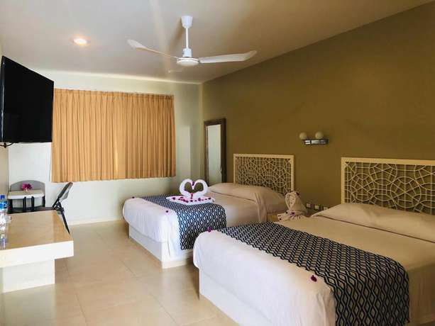 Imagen de la habitación del Hotel Huatulco Maxico. Foto 19