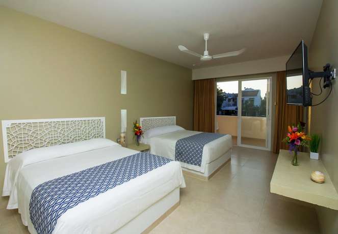 Imagen de la habitación del Hotel Huatulco Maxico. Foto 20