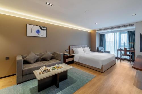 Imagen general del Hotel Huawen Four Season. Foto 4