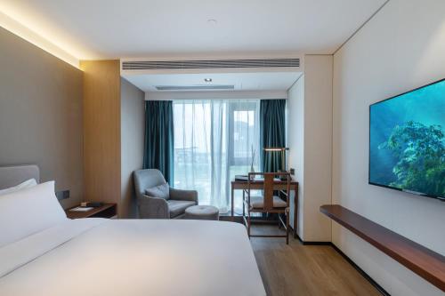 Imagen general del Hotel Huawen Four Season. Foto 7