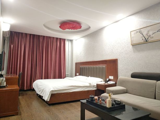Imagen de la habitación del Hotel Huaxi. Foto 6