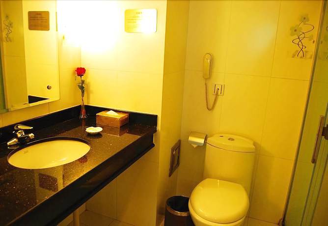 Imagen de la habitación del Hotel Huaxia Hotel. Foto 2