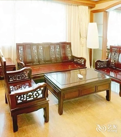 Imagen de la habitación del Hotel Huaxia Hotel. Foto 3