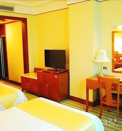 Imagen de la habitación del Hotel Huaxia Hotel. Foto 4