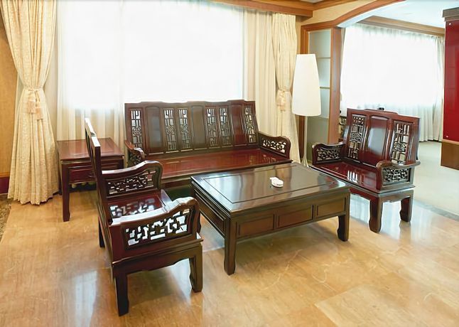 Imagen de la habitación del Hotel Huaxia Hotel. Foto 15