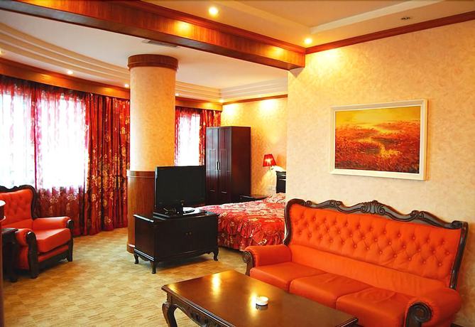 Imagen de la habitación del Hotel Huaxia Hotel. Foto 16