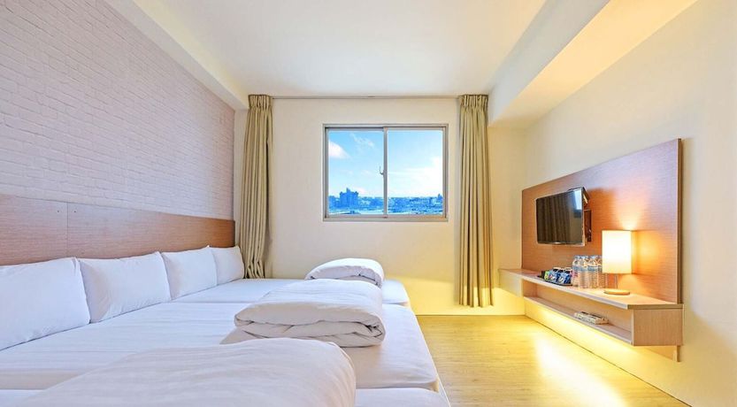 Imagen de la habitación del Hotel Huaxin. Foto 8