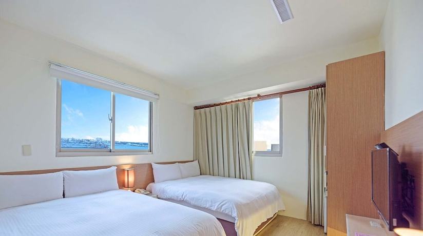 Imagen de la habitación del Hotel Huaxin. Foto 9