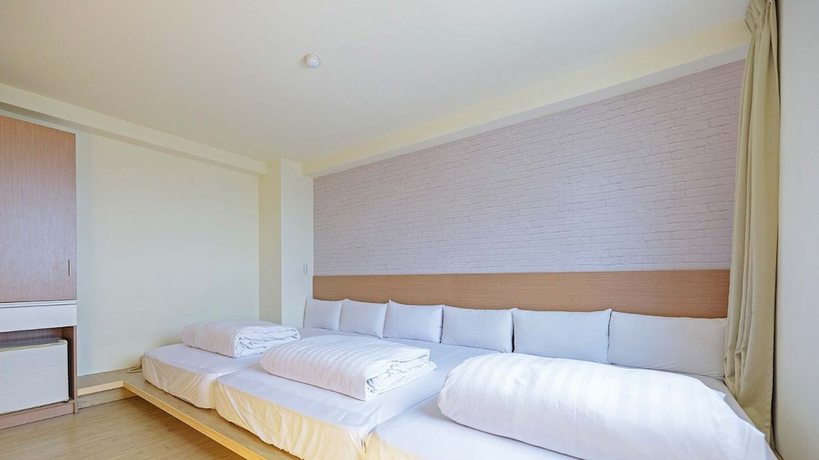 Imagen de la habitación del Hotel Huaxin. Foto 15