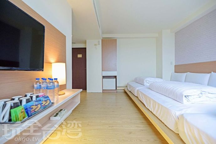 Imagen de la habitación del Hotel Huaxin. Foto 16