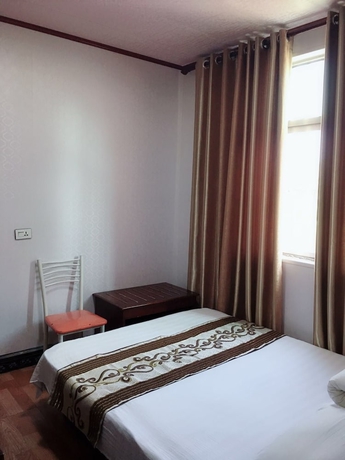 Imagen de la habitación del Hotel Huayang Guesthouse. Foto 10