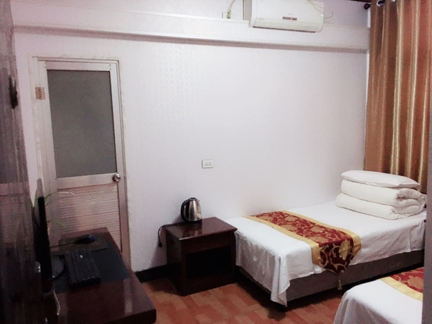 Imagen de la habitación del Hotel Huayang Guesthouse. Foto 13