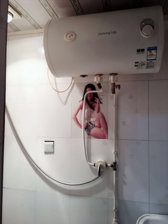 Imagen de la habitación del Hotel Huayang Guesthouse. Foto 18