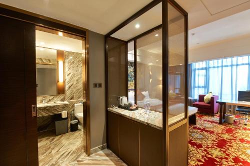Imagen de la habitación del Hotel Huayu Landmark. Foto 5