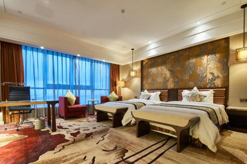 Imagen de la habitación del Hotel Huayu Landmark. Foto 6