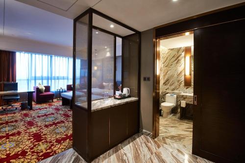 Imagen de la habitación del Hotel Huayu Landmark. Foto 9