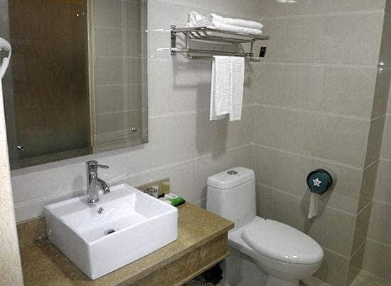 Imagen de la habitación del Hotel Huayun Business. Foto 5