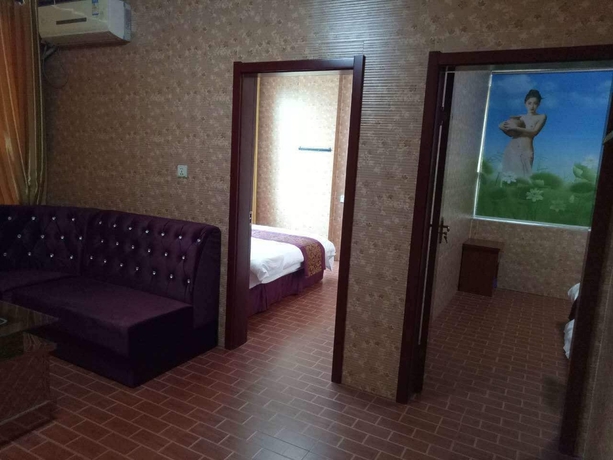 Imagen de la habitación del Hotel Huayun Business. Foto 7