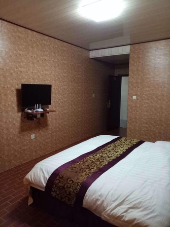 Imagen de la habitación del Hotel Huayun Business. Foto 8