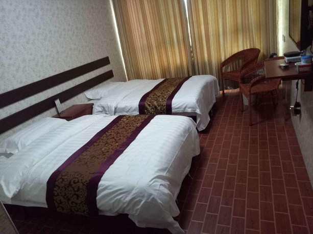 Imagen de la habitación del Hotel Huayun Business. Foto 9