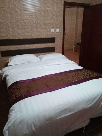 Imagen de la habitación del Hotel Huayun Business. Foto 10