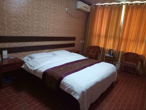 Imagen de la habitación del Hotel Huayun Business. Foto 11
