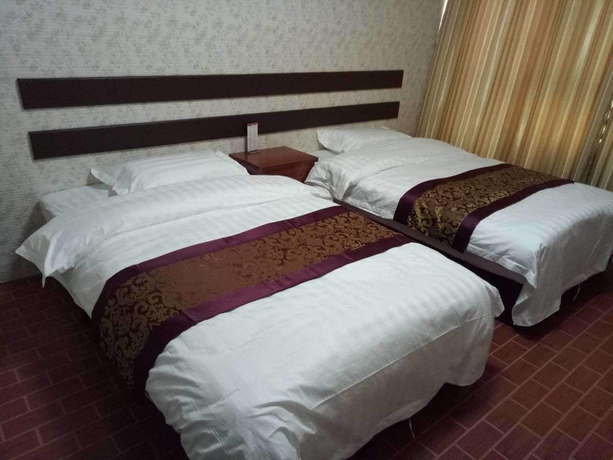 Imagen de la habitación del Hotel Huayun Business. Foto 12
