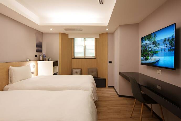 Imagen de la habitación del Hotel Hub Tucheng. Foto 22