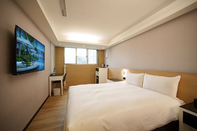 Imagen de la habitación del Hotel Hub Tucheng. Foto 33