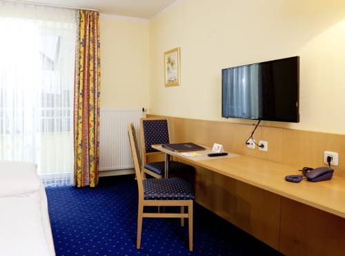 Imagen de la habitación del Hotel Huberhof, Allershausen. Foto 4