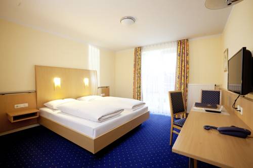 Imagen de la habitación del Hotel Huberhof, Allershausen. Foto 9
