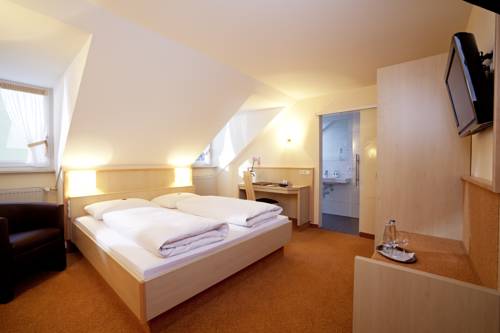 Imagen de la habitación del Hotel Huberhof, Allershausen. Foto 10