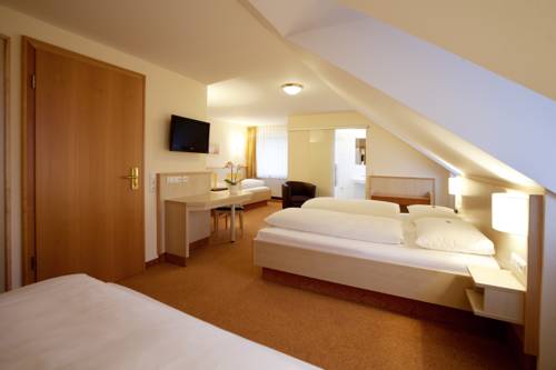 Imagen de la habitación del Hotel Huberhof, Allershausen. Foto 11