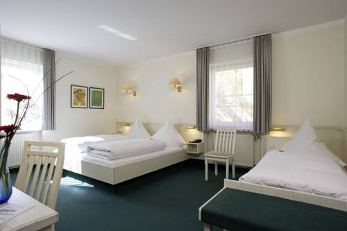 Imagen de la habitación del Hotel Huberhof, Allershausen. Foto 14