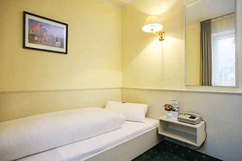 Imagen de la habitación del Hotel Huberhof, Allershausen. Foto 16