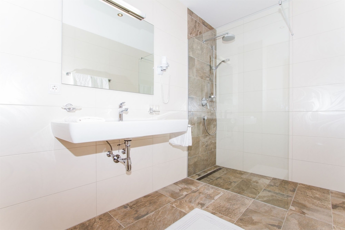 Imagen de la habitación del Hotel Huberhof, Rum . Foto 10