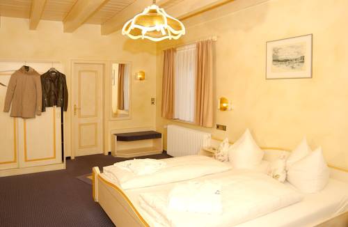 Imagen de la habitación del Hotel Hubertus Garni. Foto 5