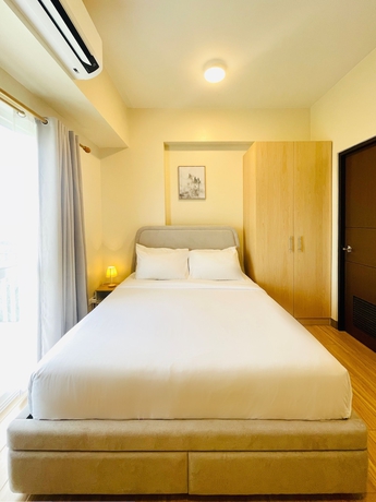Imagen de la habitación del Hotel Hubomoto Megaworld Suites. Foto 1