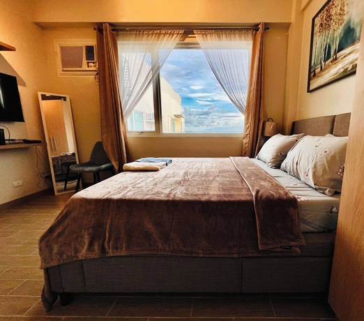 Imagen de la habitación del Hotel Hubomoto Megaworld Suites. Foto 7