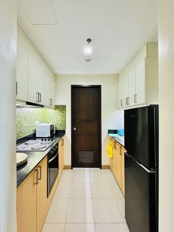 Imagen de la habitación del Hotel Hubomoto Megaworld Suites. Foto 8