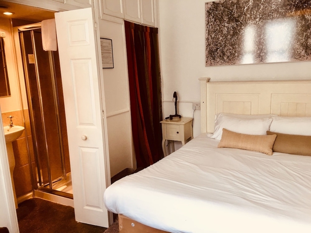 Imagen de la habitación del Hotel Hudsons. Foto 5
