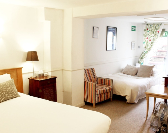 Imagen de la habitación del Hotel Hudsons. Foto 14