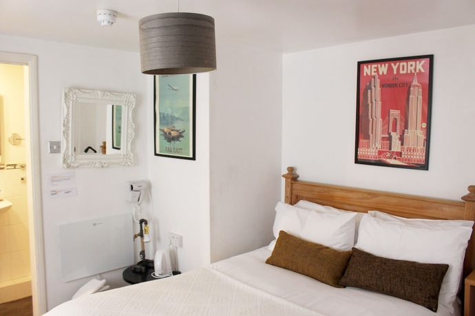 Imagen de la habitación del Hotel Hudsons. Foto 15