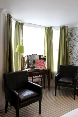 Imagen de la habitación del Hotel Hudsons. Foto 16