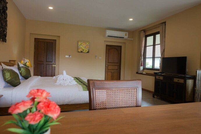 Imagen de la habitación del Hotel Hueankhamhom Resort. Foto 18