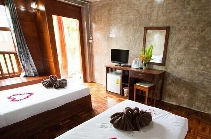 Imagen de la habitación del Hotel Huen Aumpron Resort. Foto 27