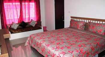 Imagen de la habitación del Hotel Huen Chan Thip. Foto 6