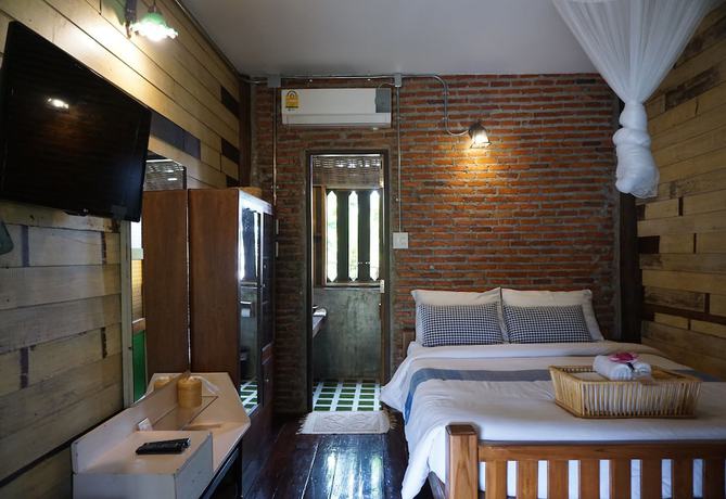 Imagen de la habitación del Hotel Huen Chang Puek. Foto 8